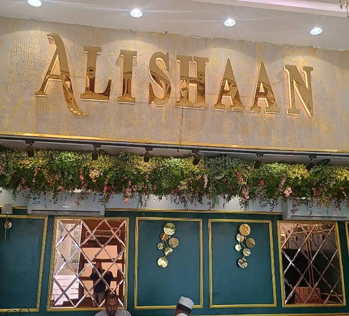Golden Alishaan signage inside the restaurant